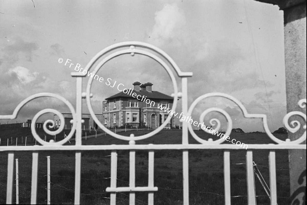 VIEW OF DEANS HOUSE THROUGH GATE